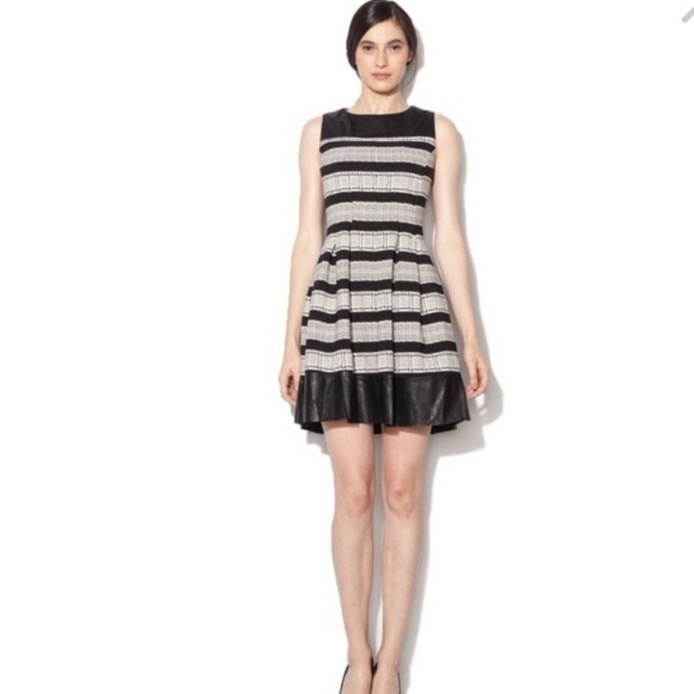 Gorgeous Rinascimento dress with imitation leather